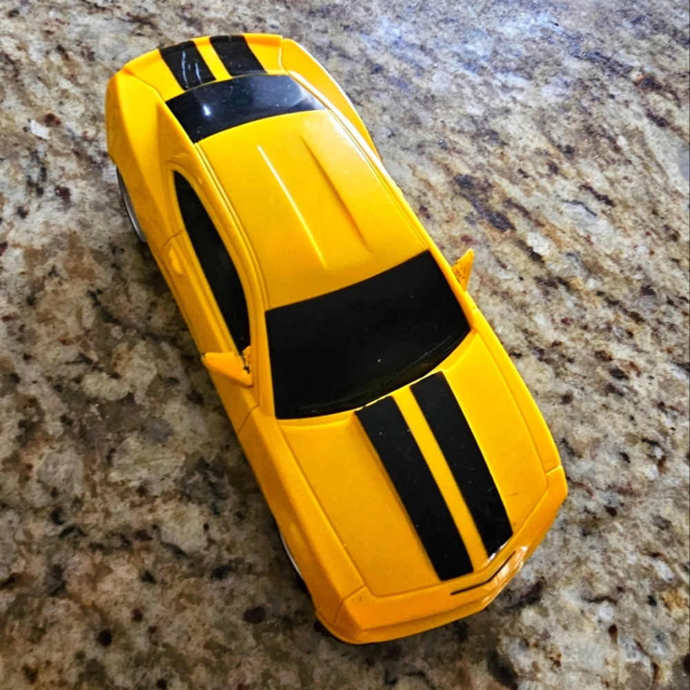 Yellow camaro toy car